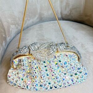 Vintage glass beaded evening bag with decorative brooch, clasp closure